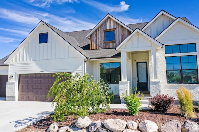 12751 S Harvest Ln W Unit 6, Riverton, UT 84096 - modern farmhouse featuring driveway, a shingled roof, a garage, and board and batten siding