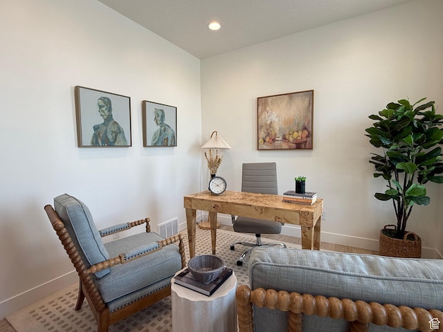 home office with recessed lighting, visible vents, and baseboards
