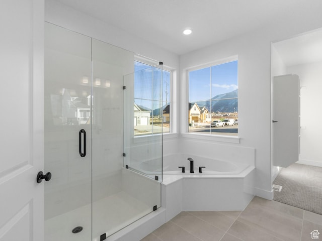 1018 S 3250 E Unit 128, Spanish Fork, UT 84660 - bathroom featuring tile patterned floors, a mountain view, and independent shower and bath