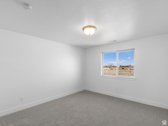 1018 S 3250 E Unit 128, Spanish Fork, UT 84660 - empty room featuring carpet and a textured ceiling