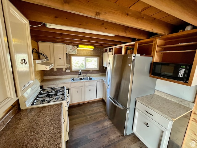 kitchen with dark hardwood / wood-style flooring, white gas range oven, sink, stainless steel refrigerator, and white cabinetry