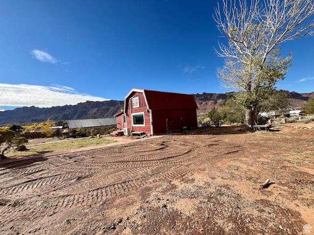 exterior space featuring a mountain view
