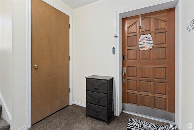633 E 6910 S, Midvale, UT 84047 - foyer entrance with dark carpet and baseboards