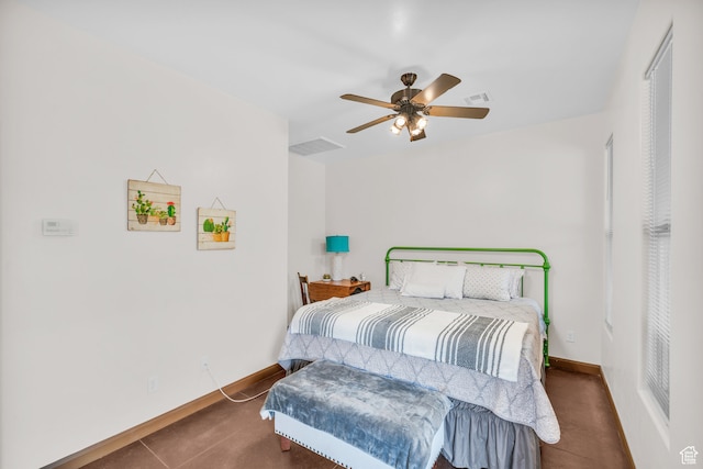 896 E Mesa Vista Dr, Ivins, UT 84738 - tiled bedroom featuring ceiling fan