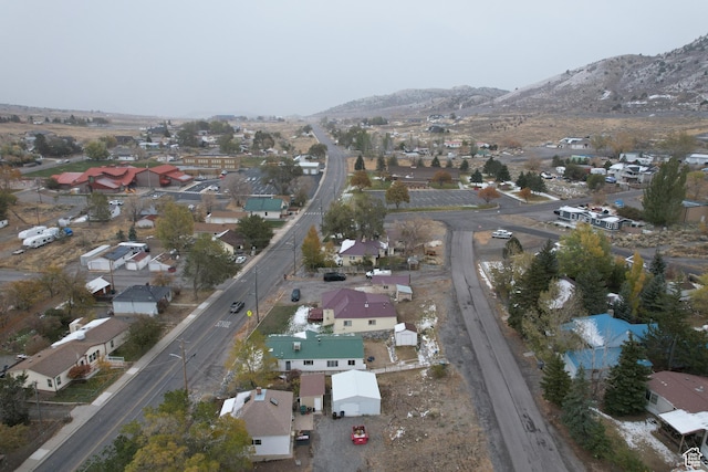 11 W Main St, Eureka, UT 84628 - aerial view of property's location featuring a mountain backdrop and nearby suburban area