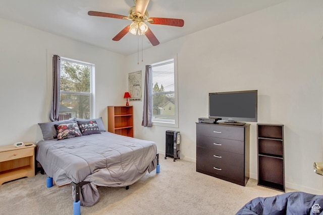 11 W Main St, Eureka, UT 84628 - bedroom featuring radiator, light colored carpet, a ceiling fan, and baseboards