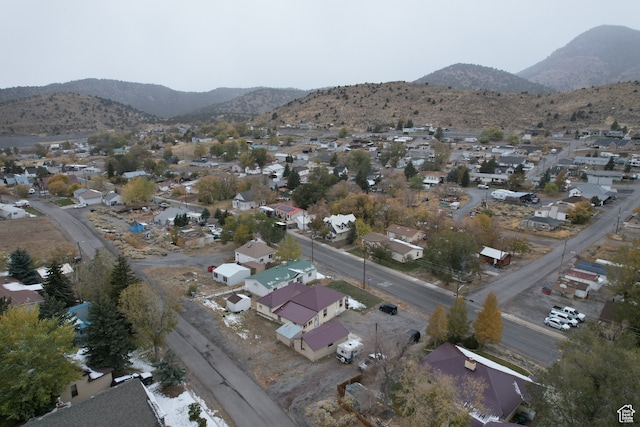 birds eye view of property featuring a mountain view