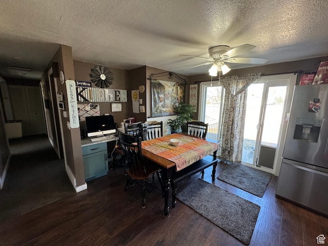 dining area with a ceiling fan, a textured ceiling, and dark wood-style flooring