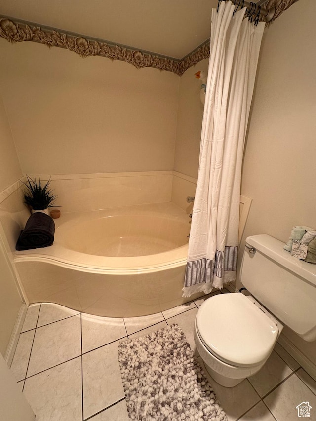 full bath featuring a bath, toilet, tile patterned floors, and a shower with shower curtain