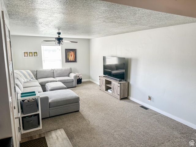 772 W 4375 S, Riverdale, UT 84405 - living area with ceiling fan, carpet, a textured ceiling, and baseboards