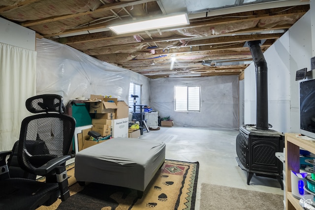 basement featuring a wood stove