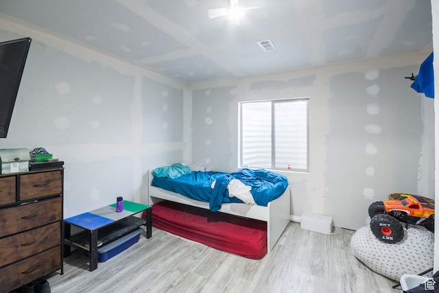 bedroom with light hardwood / wood-style flooring