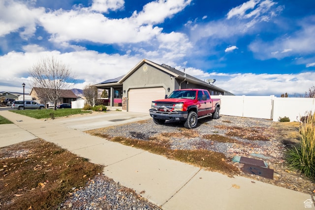 view of front of home featuring a garage