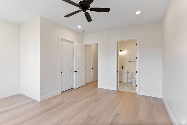231 S Wiltshire Ln, Saratoga Springs, UT 84045 - unfurnished bedroom featuring light wood finished floors, baseboards, recessed lighting, ensuite bathroom, and ceiling fan