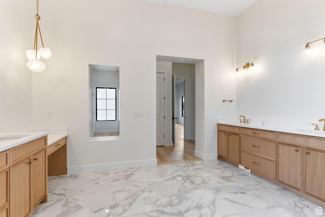 231 S Wiltshire Ln, Saratoga Springs, UT 84045 - full bathroom with marble finish flooring, a high ceiling, baseboards, and vanity