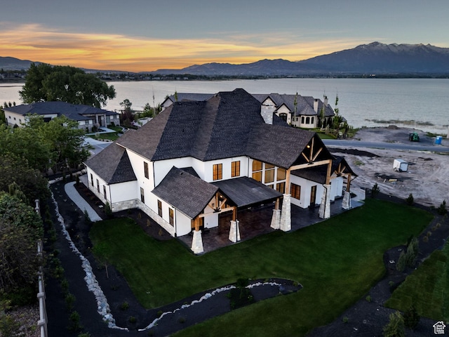 231 S Wiltshire Ln, Saratoga Springs, UT 84045 - aerial view at dusk of a water and mountain view