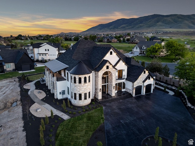 231 S Wiltshire Ln, Saratoga Springs, UT 84045 - aerial view at dusk of a mountain view and a residential view
