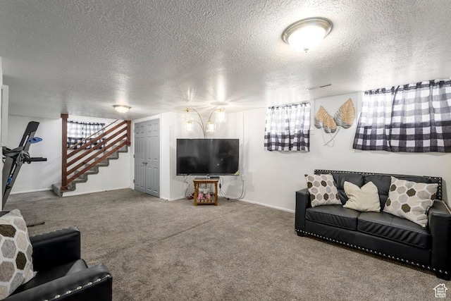 5092 W 4100 S, West Valley City, UT 84120 - living room featuring a textured ceiling, carpet flooring, stairway, and baseboards