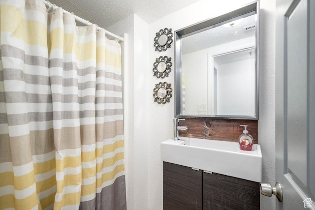 5092 W 4100 S, West Valley City, UT 84120 - full bath featuring a textured ceiling, a textured wall, and a shower with shower curtain