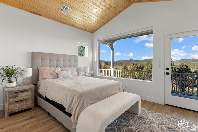 780 W Hillside Dr, Pine Valley, UT 84781 - bedroom featuring vaulted ceiling, access to exterior, hardwood / wood-style flooring, wooden ceiling, and a mountain view