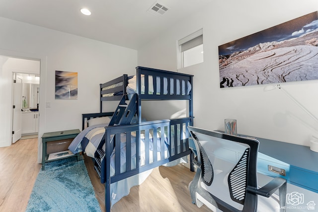 780 W Hillside Dr, Pine Valley, UT 84781 - bedroom featuring light hardwood / wood-style floors and connected bathroom
