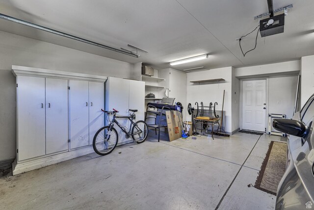 356 N Cactus Ln Unit 9, Washington, UT 84780 - garage featuring a garage door opener