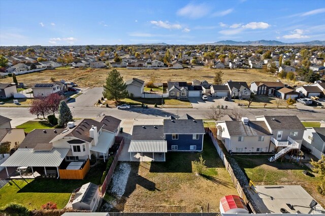 drone / aerial view featuring a mountain view