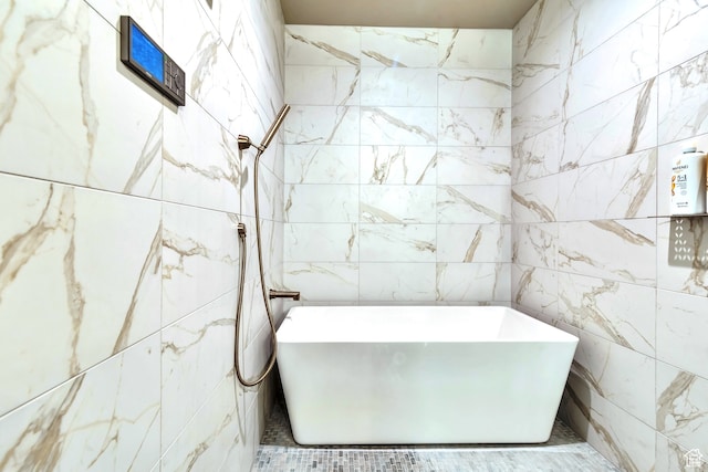 10005 N Meer Cir, Heber City, UT 84032 - bathroom featuring a bathing tub and tile walls