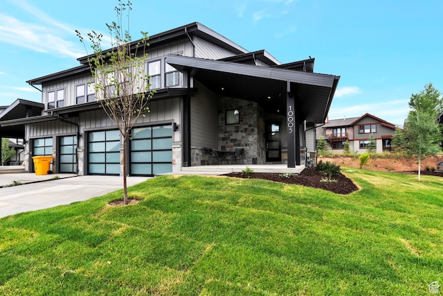 10005 N Meer Cir, Heber City, UT 84032 - view of front of home featuring a garage and a front yard