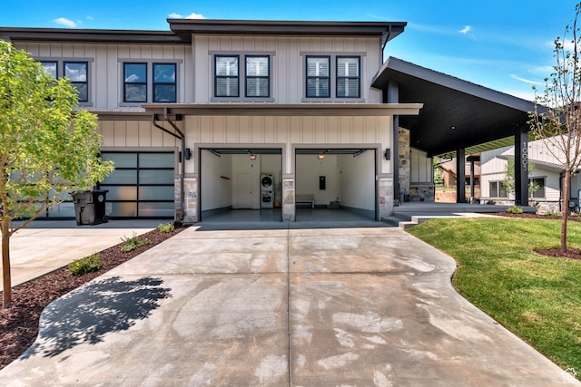10005 N Meer Cir, Heber City, UT 84032 - view of front of property featuring a garage, a front lawn, and a carport