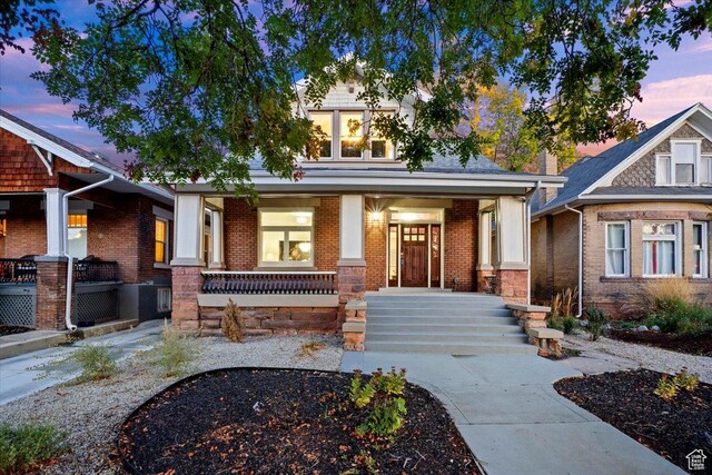 855 S 700 E, Salt Lake City, UT 84102 - craftsman house featuring a porch and brick siding