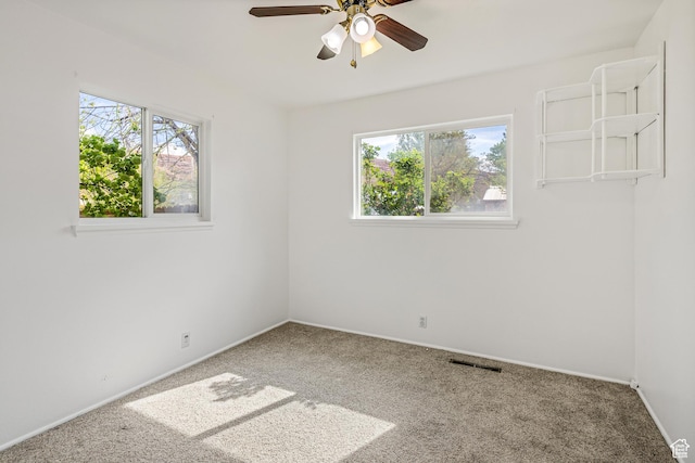 321 Park Rd, Moab, UT 84532 - carpeted spare room featuring plenty of natural light and a ceiling fan