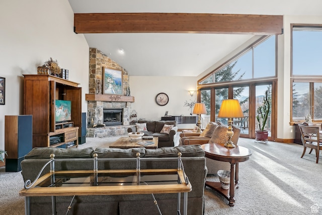 carpeted living room with beamed ceiling, a fireplace, and high vaulted ceiling