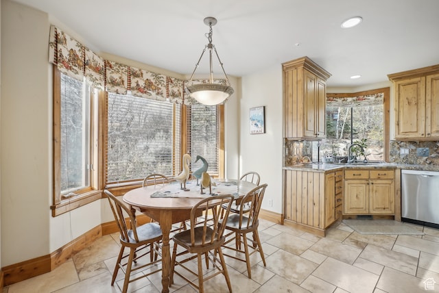 dining area featuring sink
