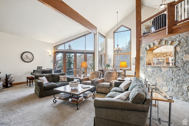 carpeted living room with beam ceiling, ceiling fan, and high vaulted ceiling