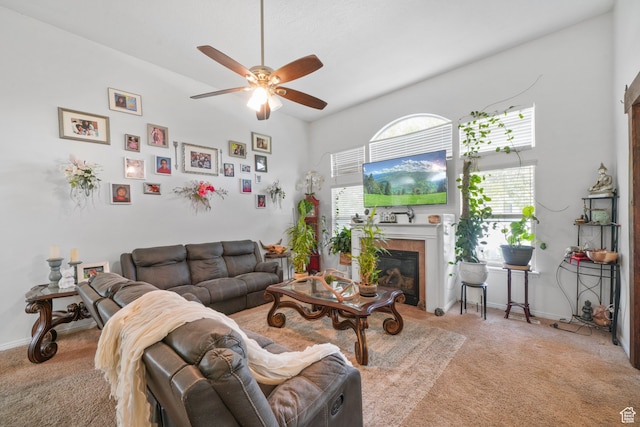 1567 S 1700 E, Spanish Fork, UT 84660 - living room featuring ceiling fan, a tiled fireplace, and light carpet