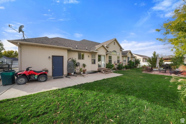 1567 S 1700 E, Spanish Fork, UT 84660 - rear view of property with a lawn and a patio