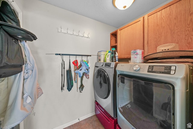 1567 S 1700 E, Spanish Fork, UT 84660 - laundry area featuring light tile patterned flooring, a textured ceiling, cabinets, and washer and dryer