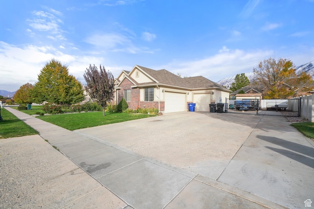 1567 S 1700 E, Spanish Fork, UT 84660 - view of front facade featuring a garage and a front lawn