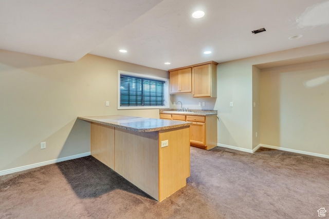 3635 S Arbor Park Dr, Magna, UT 84044 - kitchen with a sink, light carpet, light brown cabinets, recessed lighting, and baseboards