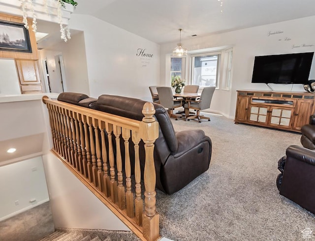 180 N 1100 E Unit 133, Washington, UT 84780 - carpeted living room with baseboards and lofted ceiling