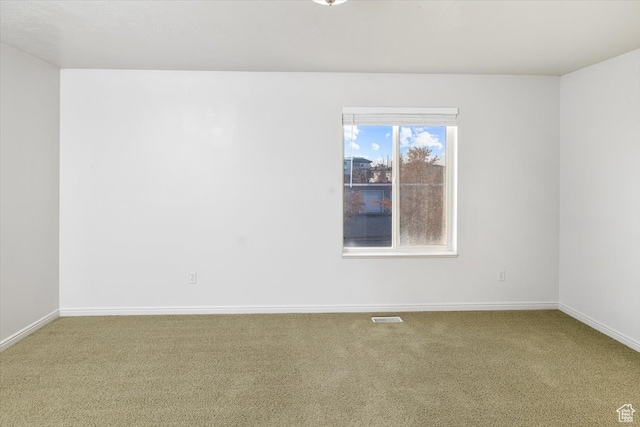 view of carpeted spare room