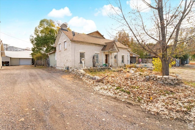 165 S 200 W, Manti, UT 84642 - view of side of home with a chimney and an outbuilding