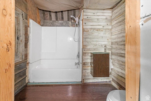 165 S 200 W, Manti, UT 84642 - full bathroom with wood walls, shower / washtub combination, and wood finished floors