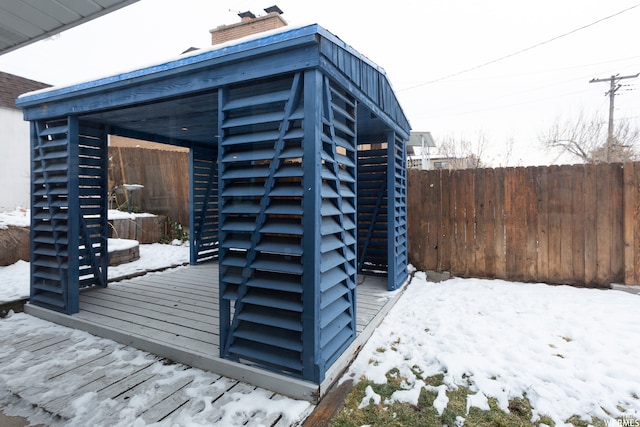 view of snow covered deck