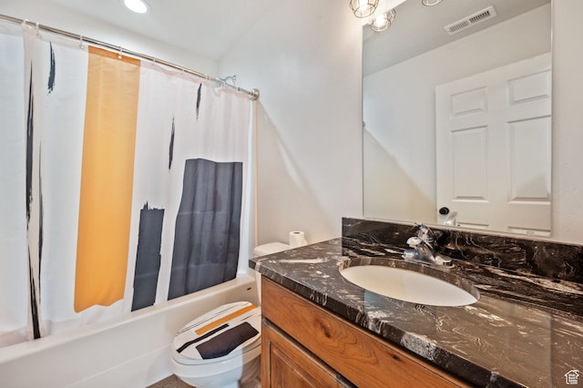 full bathroom featuring vanity, shower / bath combination with curtain, and toilet