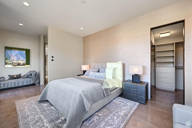 1748 N Cochise Dr, Ivins, UT 84738 - bedroom with finished concrete flooring, a spacious closet, recessed lighting, and a closet