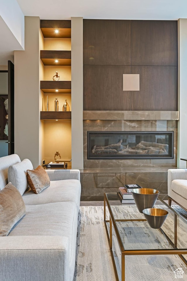 1748 N Cochise Dr, Ivins, UT 84738 - living area with a glass covered fireplace and wood finished floors