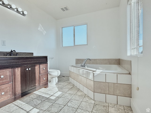 660 S 2500 W, Vernal, UT 84078 - bathroom with a tub, vanity, and toilet