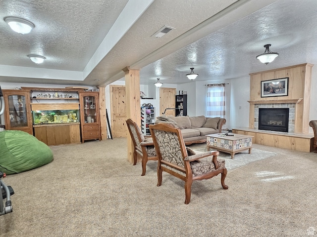 660 S 2500 W, Vernal, UT 84078 - carpeted living room featuring a fireplace and a textured ceiling